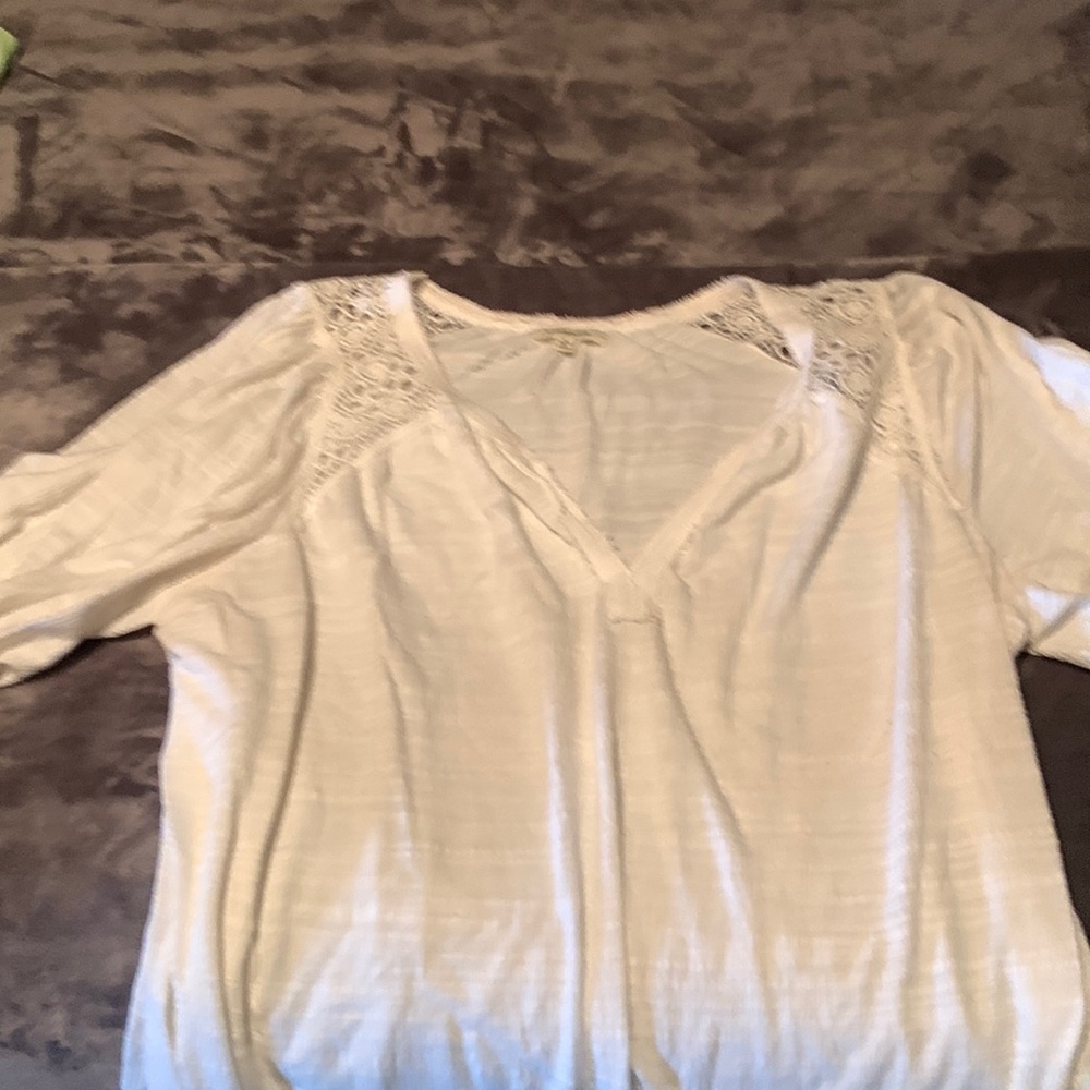Cute long loose fitting light weight shirt. White perfect for summer